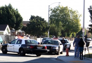 Members of the Norwalk Sheriff's Department respond to car-to-car shooting incident at Carmenita and Rosecrans at Claressa. Randy Economy Photo