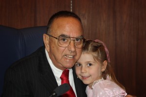 Newly installed Norwalk Mayor Luigi Vernola shares a special moment with his granddaughter. Randy Economy Photo