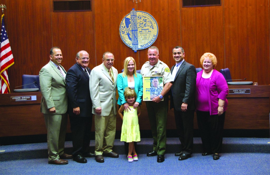 Los Angeles Sheriff’s Commander Patrick Maxwell is joined members of his family during this week’s Norwalk City Council meeting.  Mayor Luigi Vernola (center) is joined by fellow members of the city council.  Kristen Grafft Photo