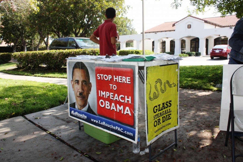 Obama protester Ed Ciampini sets up at Cerritos Post Office on Carmenita Road and 183rd Street on Monday morning. Photo by Randy Economy