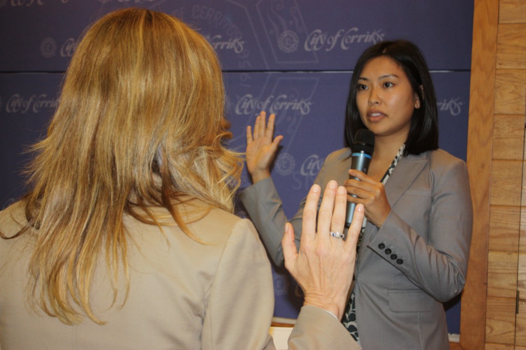 : New Planning Commissioner Tatiana Yokoyama takes oath of office from Cerritos City Clerk Vita Barrone at Monday’s city council meeting.  Randy Economy Photo