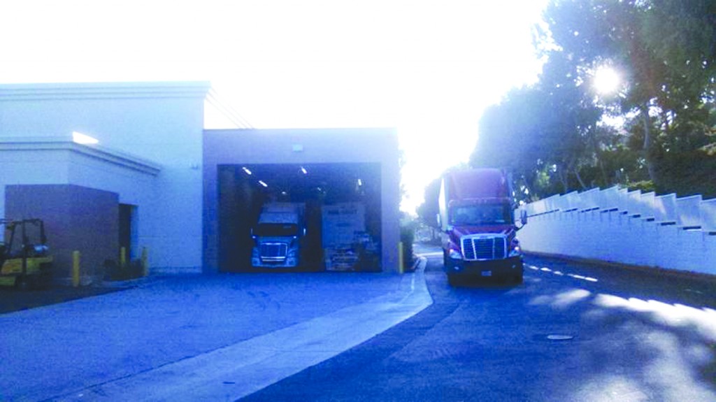 Delivery trucks line up at new Wal Mart Market in Cerritos.