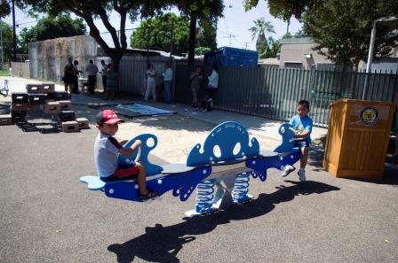 Kids play on the new "See Saw" at Padleford Park in Artesia.  Kristin Grafft Photo and Article