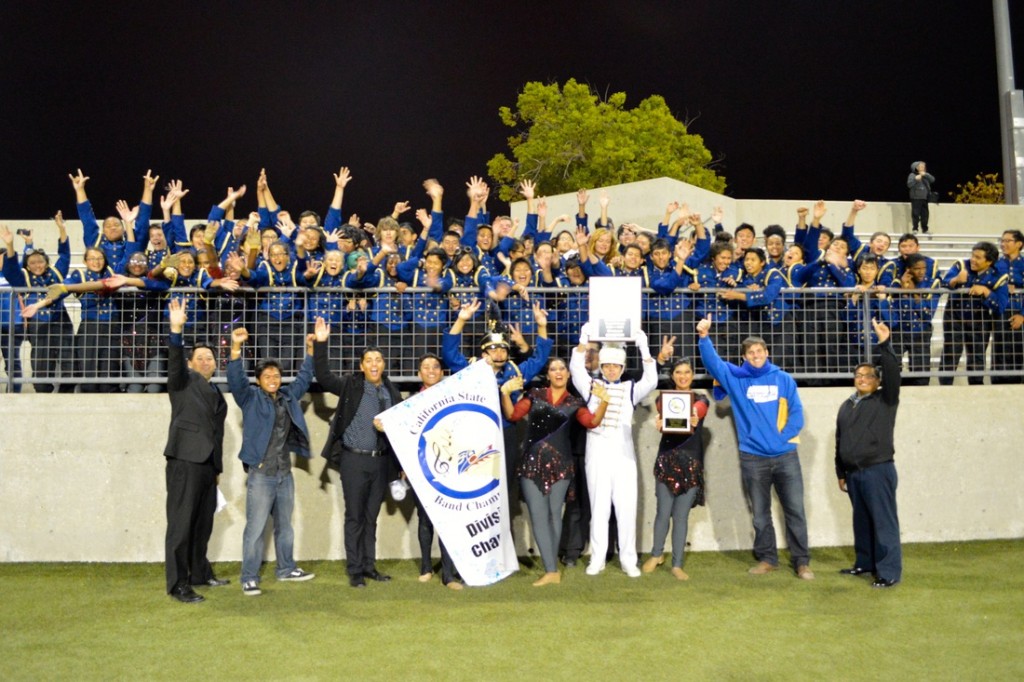 The Gahr High School “Marching Gladiators” have captured the California High School Marching Band Championship for 2013. Here the band celebrates their victory after the results were announced. 