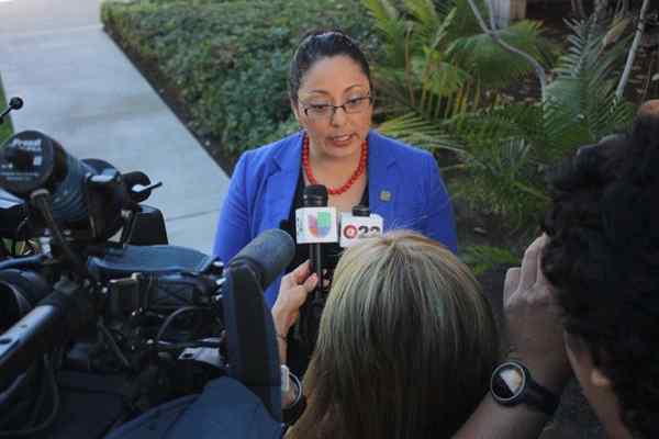 Assemblywoman Cristina Garcia addresses media members at Bell Gardens City Hall.