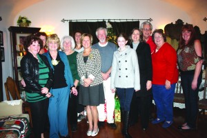 Members of the Artesia-Cerritos Historical Society gather to celebrate the holidays at the Dantema-Frampton House.  Randy Economy Photo